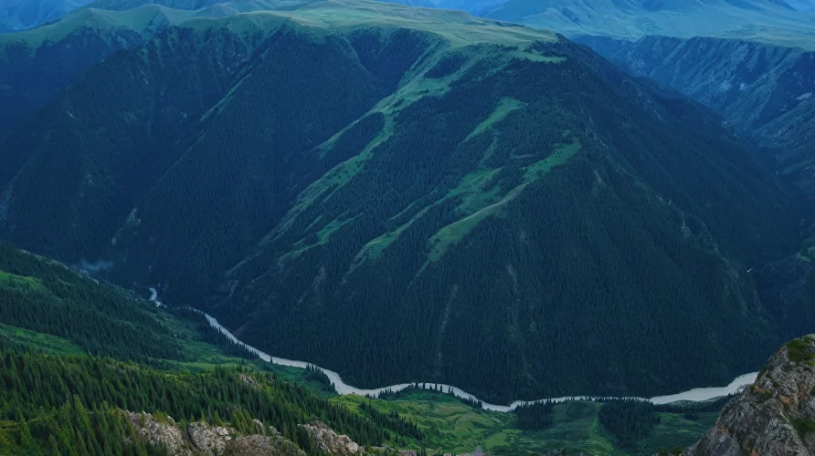 Panoramic view from a high plateau over the Chilik River and mountain gorge