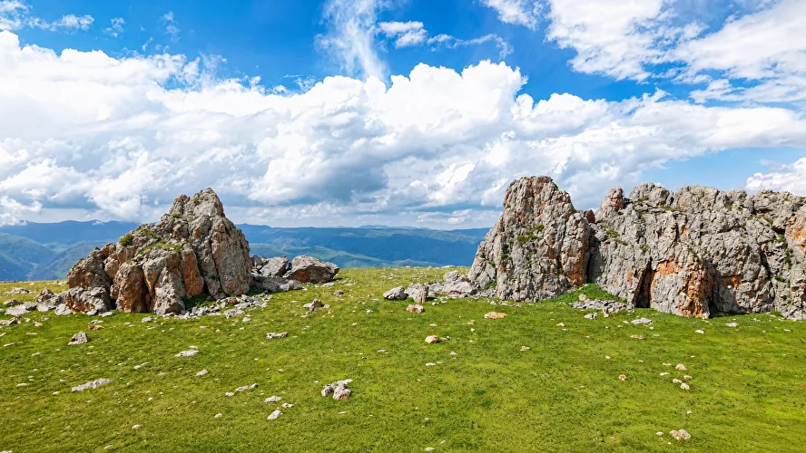 Rock formations on a high-altitude plateau during the Edge of the Sky tour