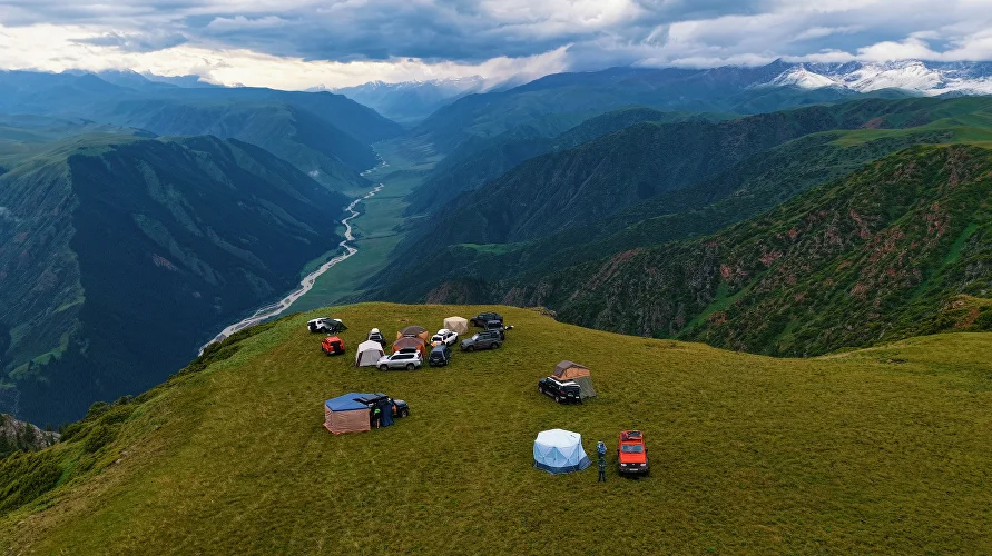 Tent camp on a high-altitude plateau above Chilik River Gorge in Kazakhstan